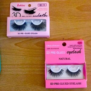 2 sets of Lash extensions. Both are pre-glued. They have been open but unused
